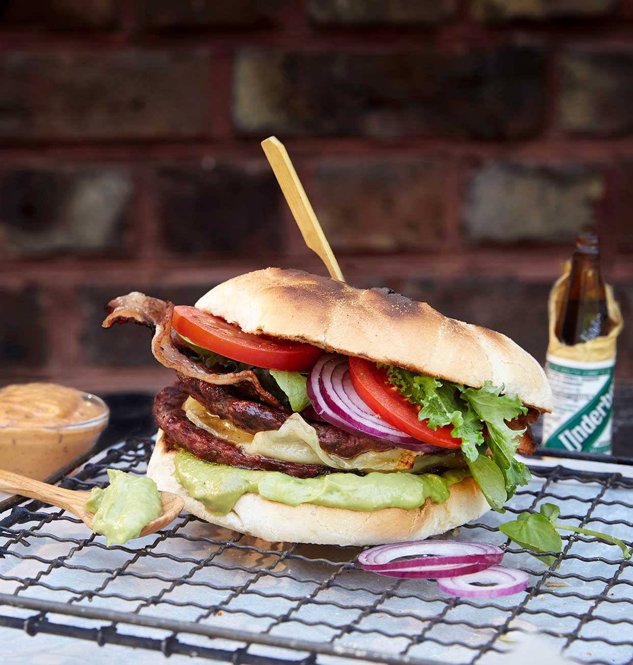 Grilled venison burgers with avocado mayonnaise and horseradishmustard